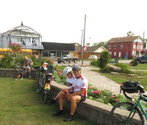 Louise, Dan, rob working on bike in background